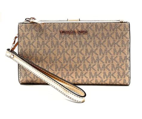 michael kors lg zip clutch|michael kors wristlets.